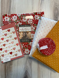 Playing Cupid Multi color background quilt kit